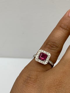 0.57 Carat Emerald Cut Ruby and Diamond Engagement Ring in 18k White Gold