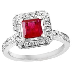 0.57 Carat Emerald Cut Ruby and Diamond Engagement Ring in 18k White Gold