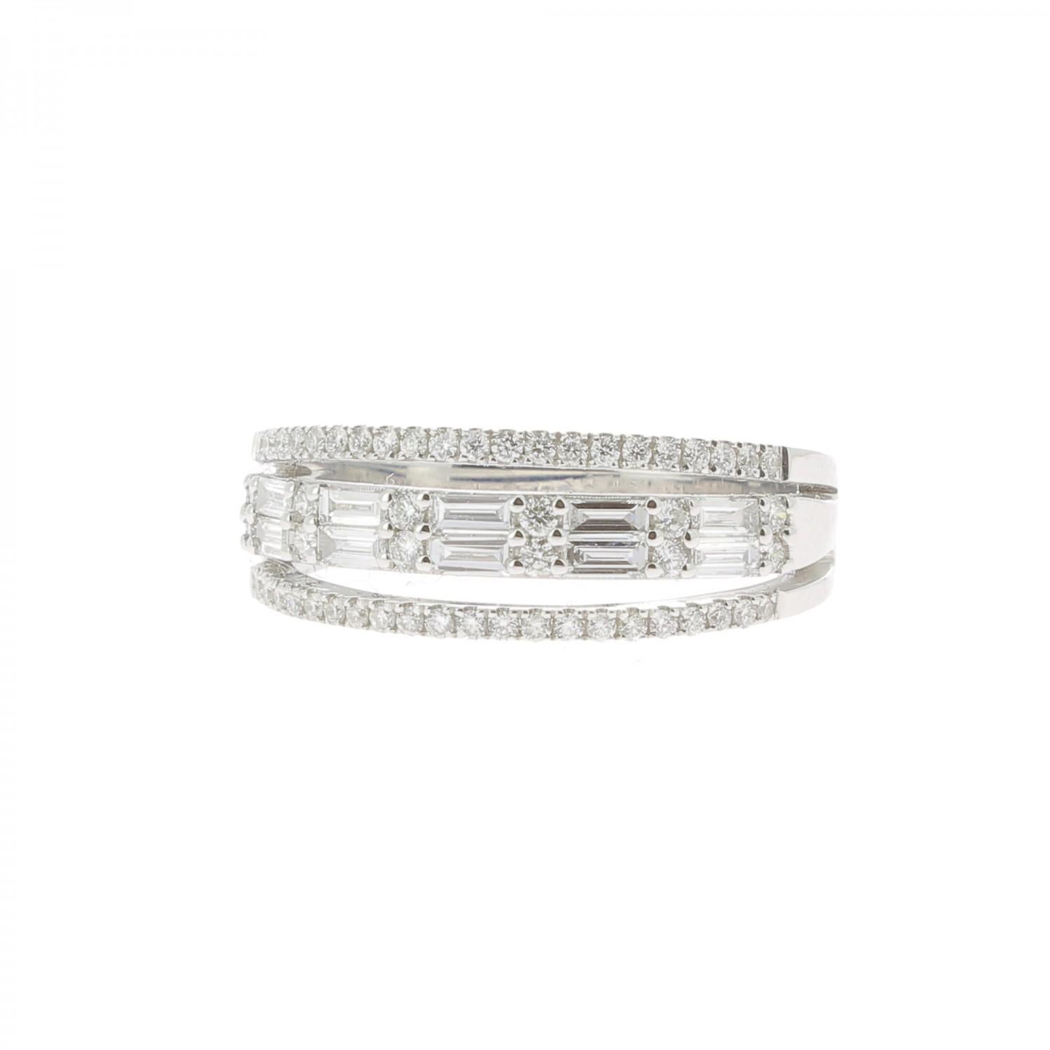 A wonderful Diamond Ring set with 3 row of Round Diamonds and Baguette Diamonds weighing 0,57 Carats.
The Diamonds are GVS quality.
The  Diamond Cocktail Ring is in 18K White Gold.
The ring weight 4,48 Grams.
The ring size is 6 ½ US and can be size.

