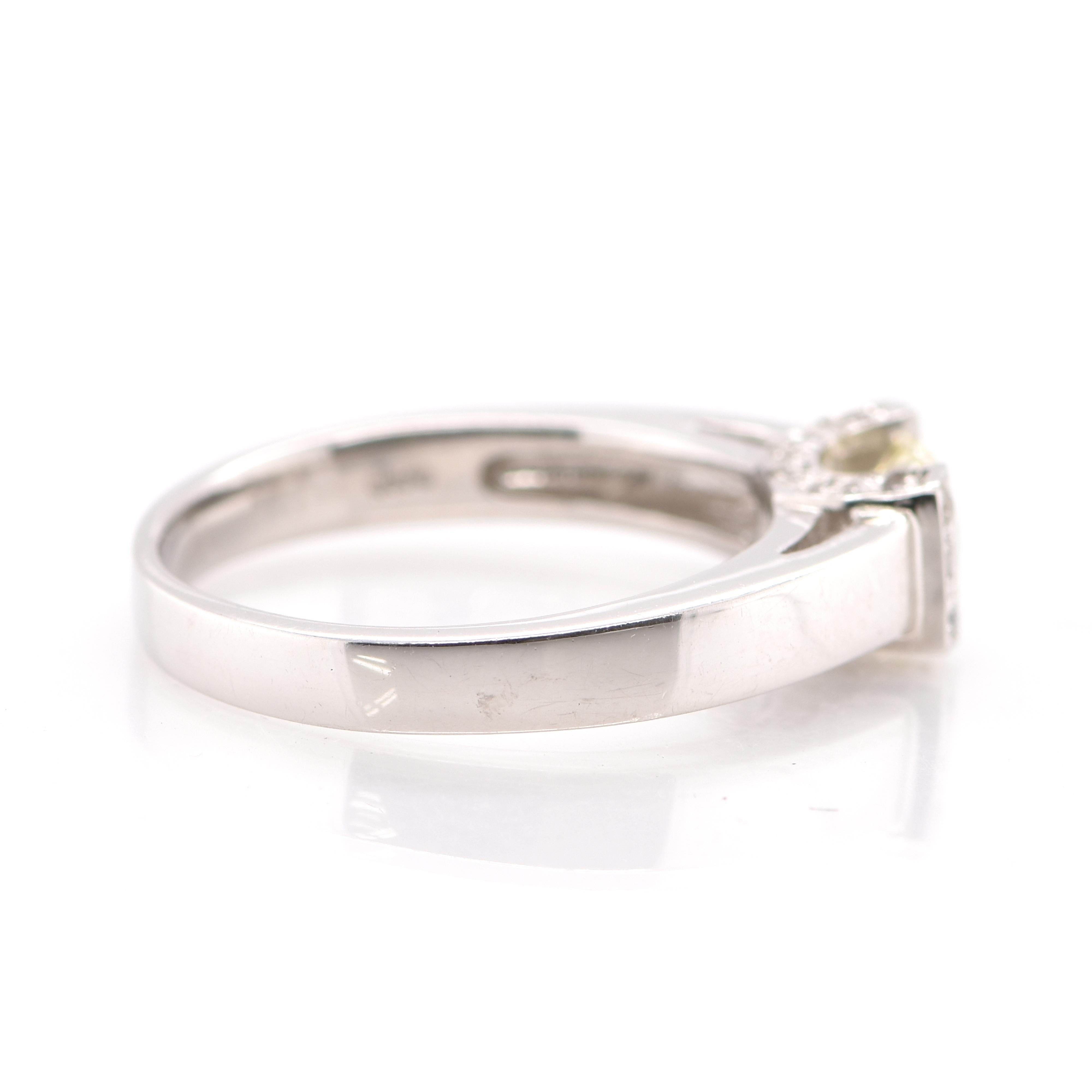 Round Cut 0.57 Carat Natural Diamond Engagement Ring Set in Platinum For Sale