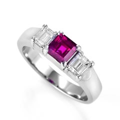 0.57 Carat Natural Ruby and Diamond Three Stone Ring Made in Platinum