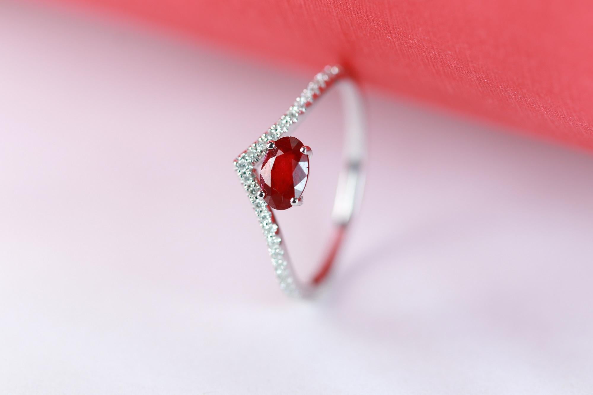 Stunning, timeless and classy eternity Unique Ring. Decorate yourself in luxury with this Gin & Grace Ring. The 14k White Gold jewelry boasts Oval Cut Prong Setting Genuine Ruby (1 pcs) 0.57 Carat, along with Natural Round cut white Diamond (23 Pcs)