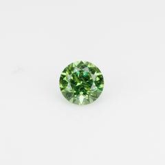 0.57 ct, Faceted Russian demantoid garnet
