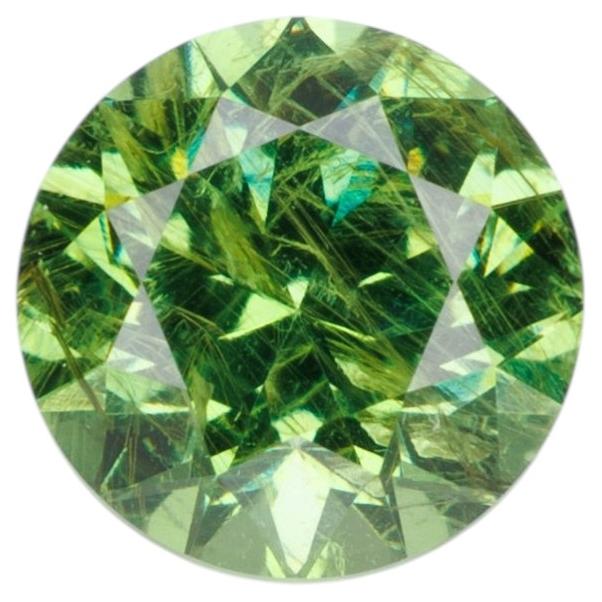 0.57 ct, Faceted Russian demantoid garnet