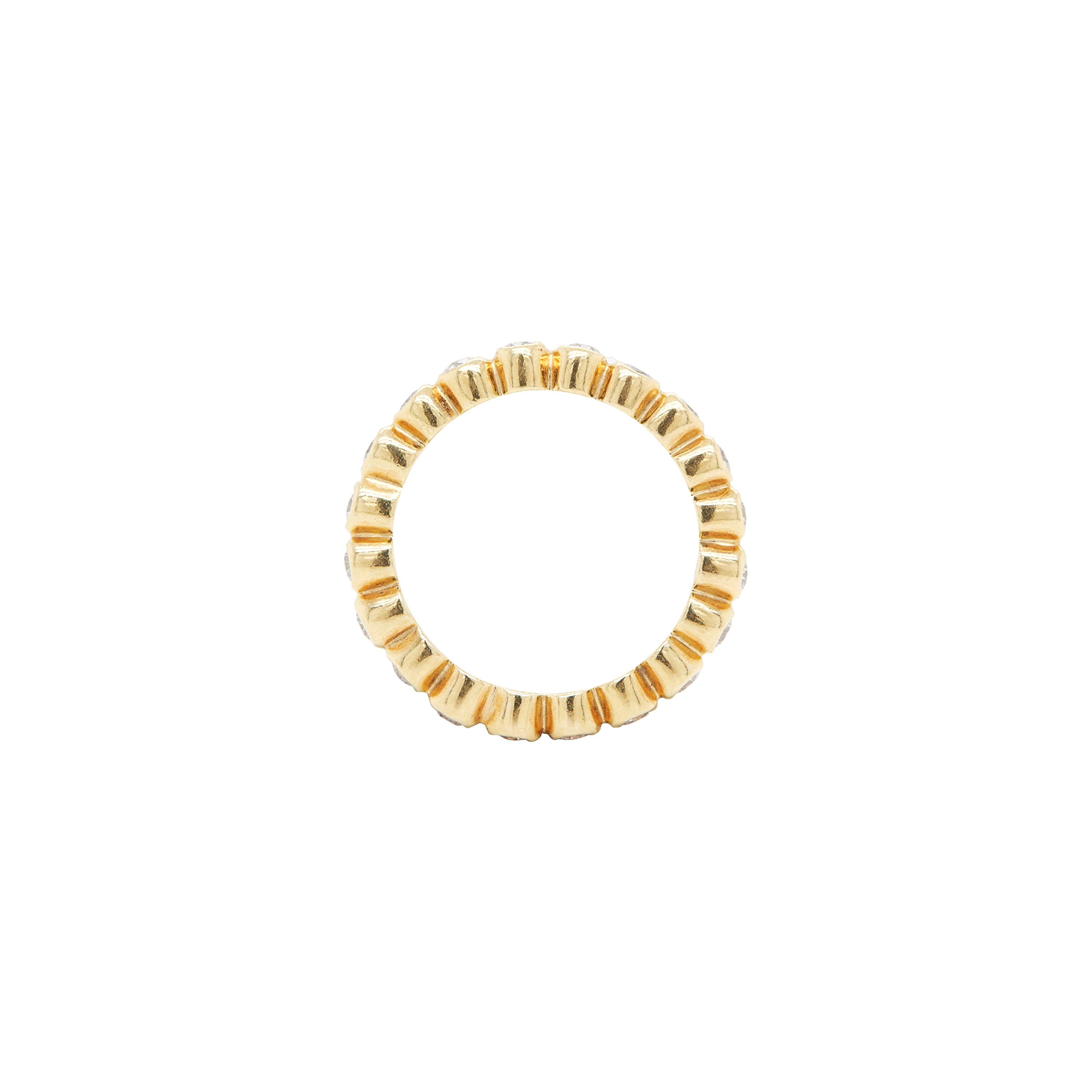 Either for stacking or wearing alone, you won't get tired of wearing this wonderful full eternity wedding band.

The ring is beautifully highlighted all the way around by 20 fine quality round brilliant cut diamonds, with a total combined weight of