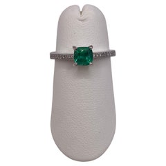0.57ct Emerald & Round Diamond Ring in 14KT White Gold