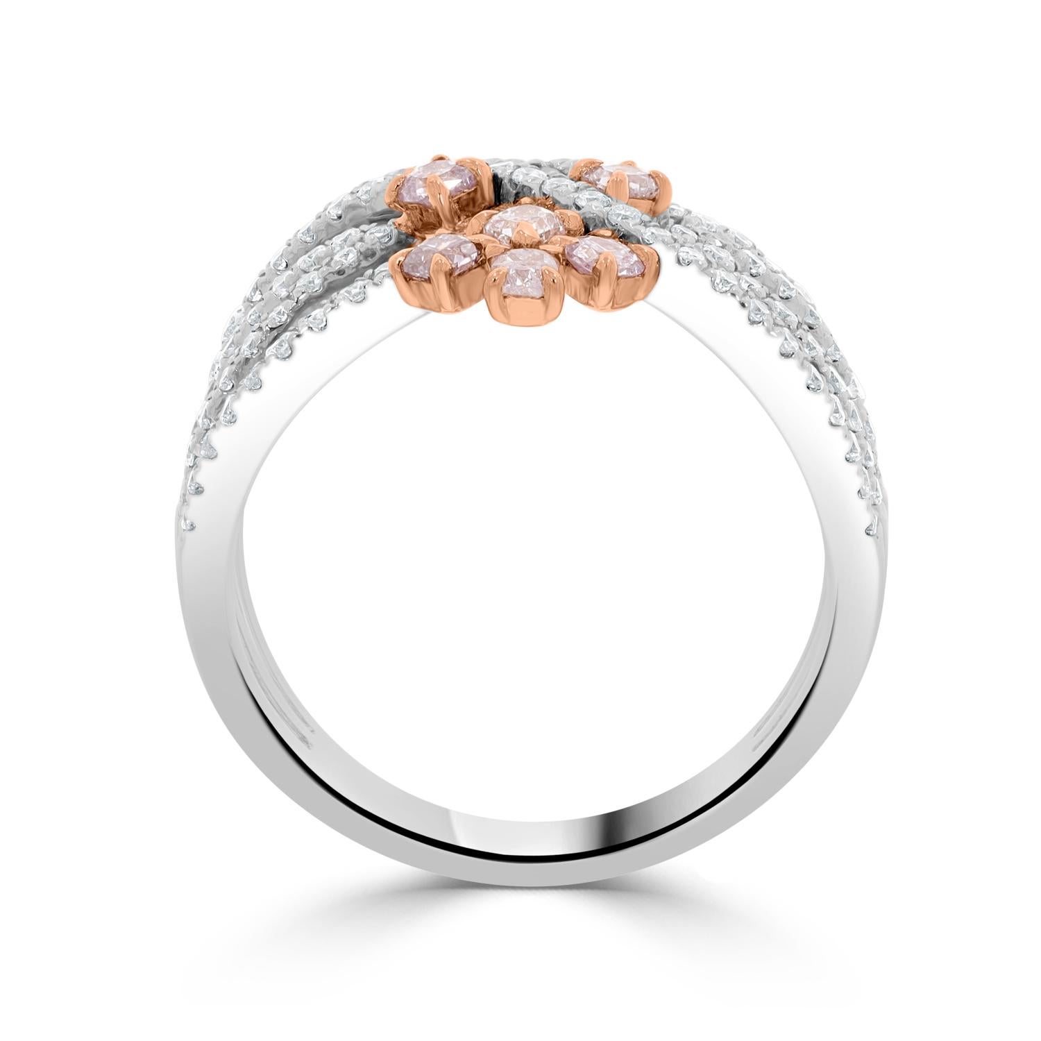 This ring is sure to be a treasured addition to your jewelry collection. Designed of 14k two-tone gold, this ring is treasured for its natural beauty and radiance. To add further brilliance, this ring is set with cushion-cut pink Diamond and round