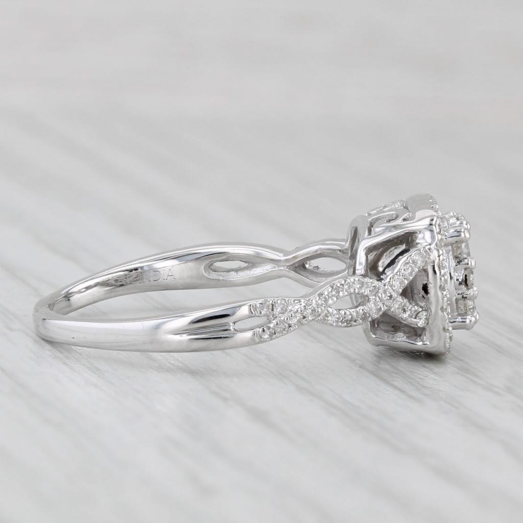 Informations sur les pierres précieuses :
- Diamants naturels -
Total des carats - 0.57ctw
Couper -  Ronde, Brilliante et Simple
Couleur - G - I
Clarté - I1 - I2

Métal : Or blanc 14k
Poids : 4,7 grammes 
Timbres : 14k
Hauteur de la face : 9.8 mm