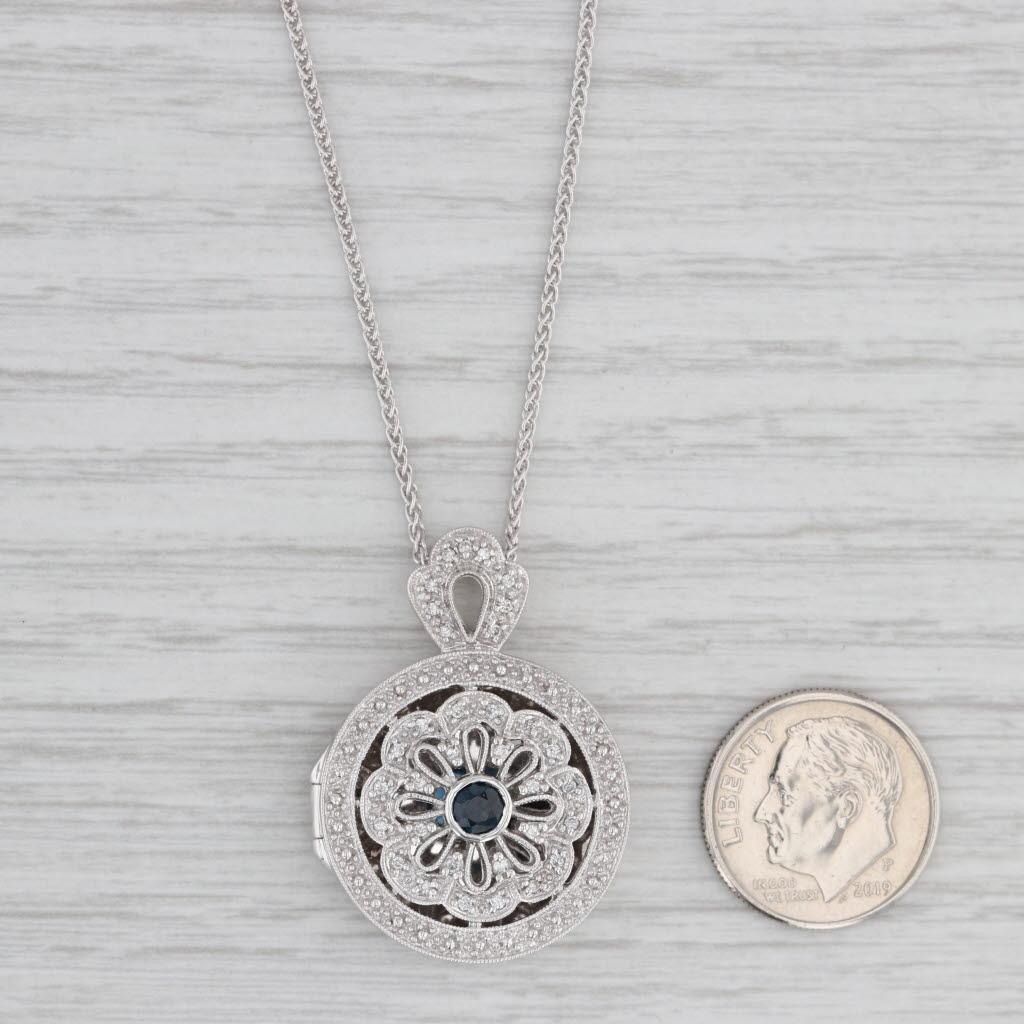 This lovely pendant necklace set features a diffuser style pendant which opens via a hinge to reveal a solid back and openwork front. A perfumed swath can be closed inside so that the fragrance can filter through.

Gemstone Information:
- Natural