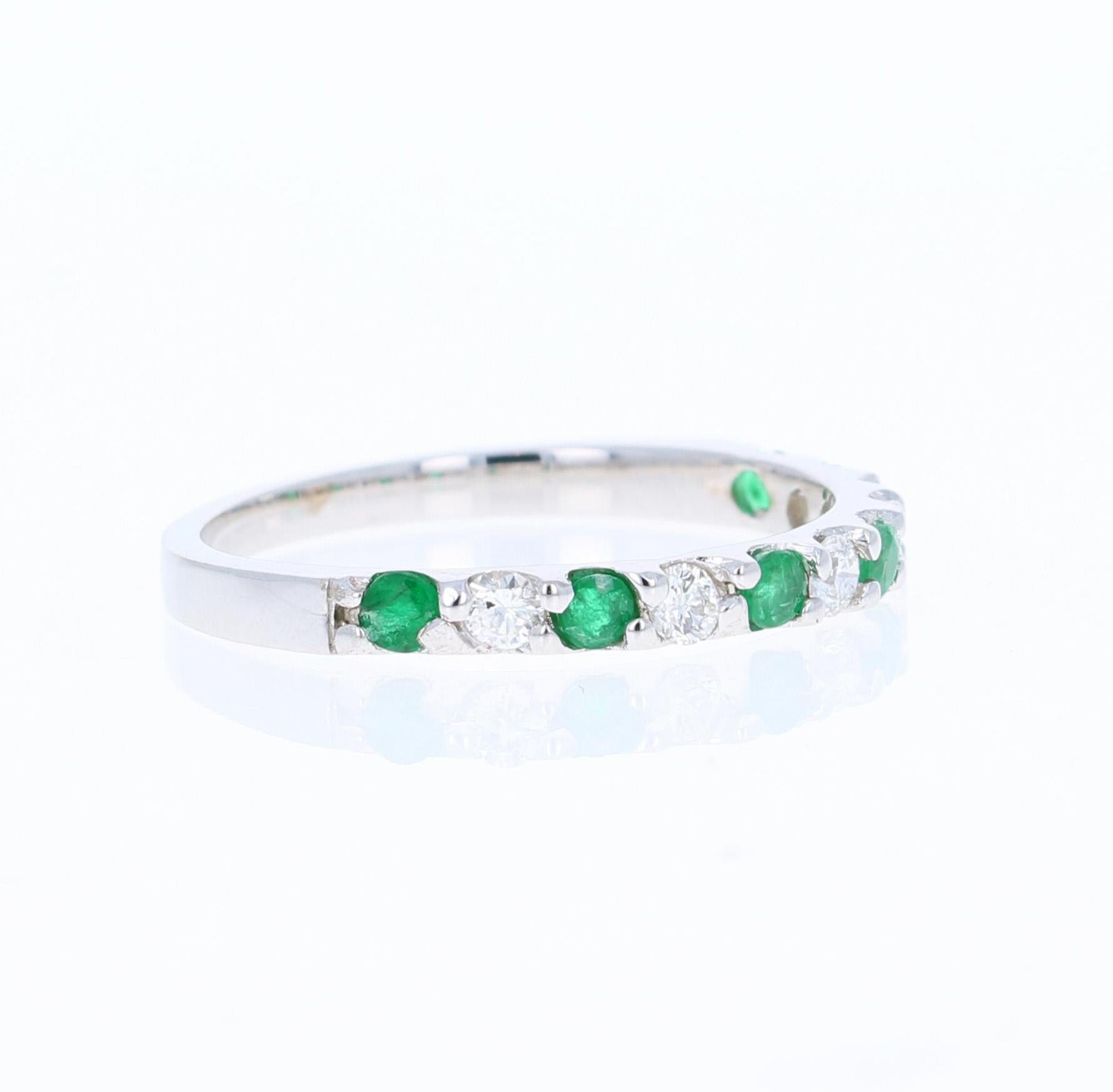 0.58 Carat Emerald and Diamond 14K White Gold Band

This is a classic Band that is a must-have!
It has 6 Emeralds that weigh 0.30 Carats and 7 Round Cut Diamonds that weigh 0.28 Carats. (Clarity: SI, Color: F) The Total Carat Weight of the Band is