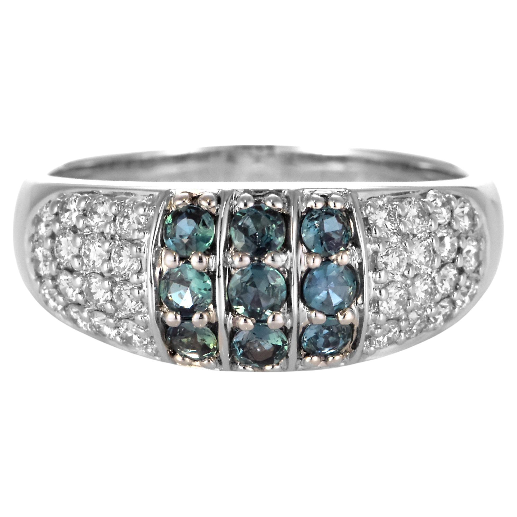 0.58 Carat Natural Alexandrite and Diamond Ring Made in 18 Karat White Gold