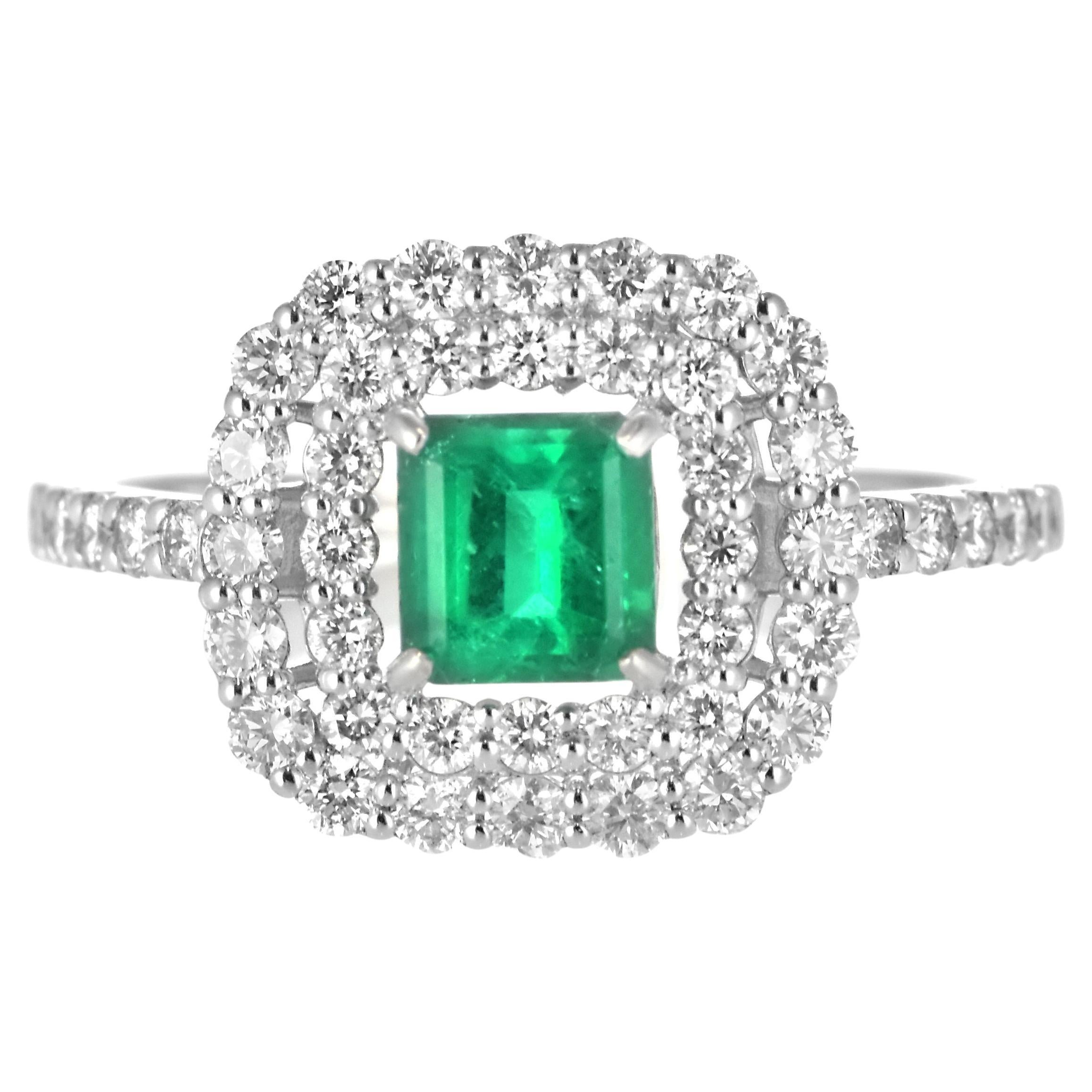 0.58 Karat natürlicher kolumbianischer Smaragd und Diamantring aus Platin