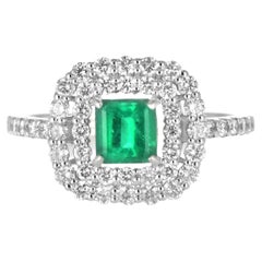 0.58 Karat natürlicher kolumbianischer Smaragd und Diamantring aus Platin