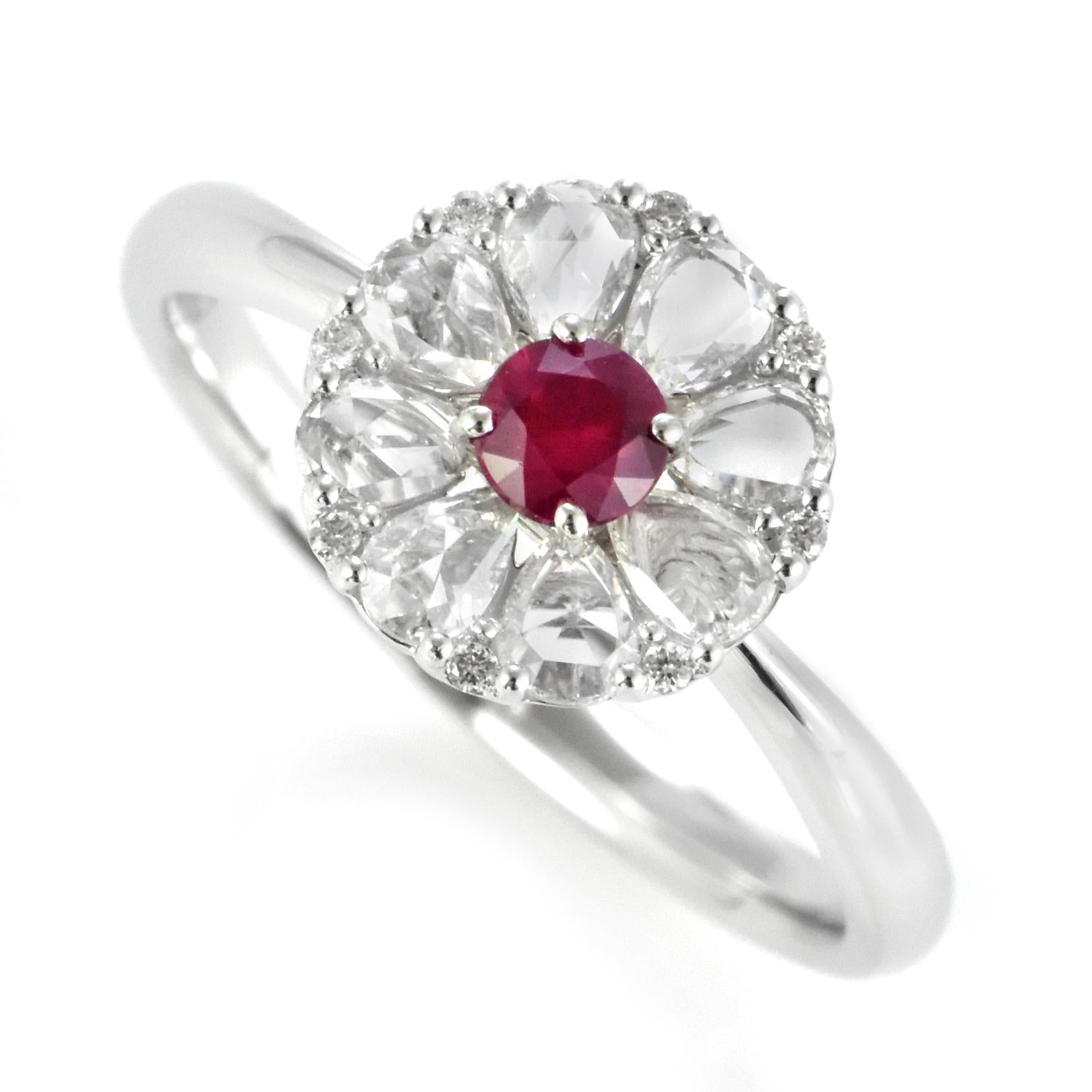 A beautiful Ring made in 18 Karat White Gold featuring 0.58 Carats Natural Ruby and 0.20 Carat Diamonds. Rubies are referred to as 