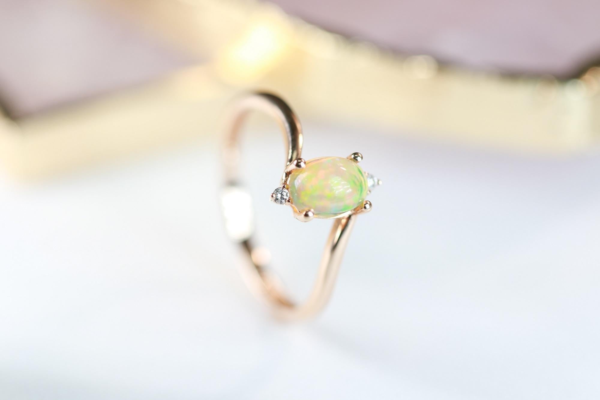 Stunning, timeless and classy eternity Unique Ring. Decorate yourself in luxury with this Gin & Grace Ring. The 14k Yellow Gold jewelry boasts Oval Cab Prong Setting Genuine Ethiopian Opal (1 pcs) 0.58 Carat, along with Natural Round cut white
