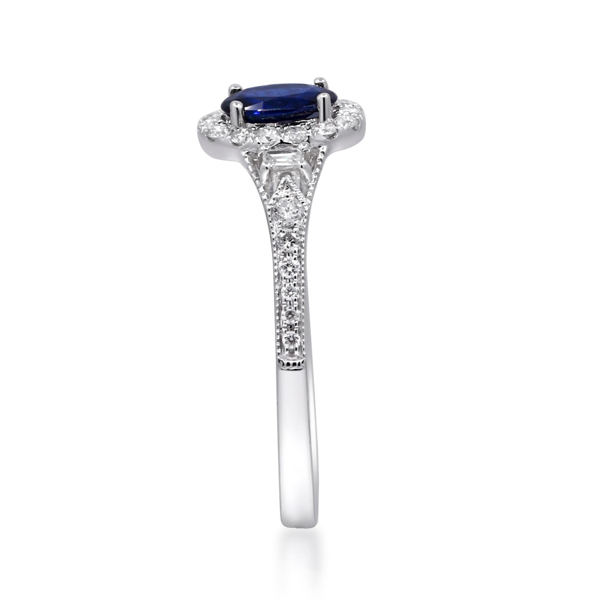 Decorate yourself in elegance with this Ring is crafted from 14-karat White Gold by Gin & Grace. This Ring is made up of Oval-Cut Blue Sapphire (1 pcs) 0.58 carat and Round-cut White Diamond (26 Pcs) 0.23 Carat, Baguette-cut White Diamond (2 pcs)