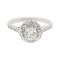 0.58 Carat Round Diamond Gold Engagement Ring