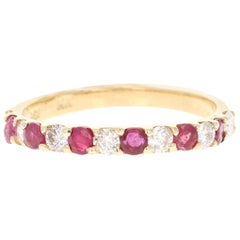 0.58 Carat Ruby and Diamond 14 Karat Yellow Gold Band