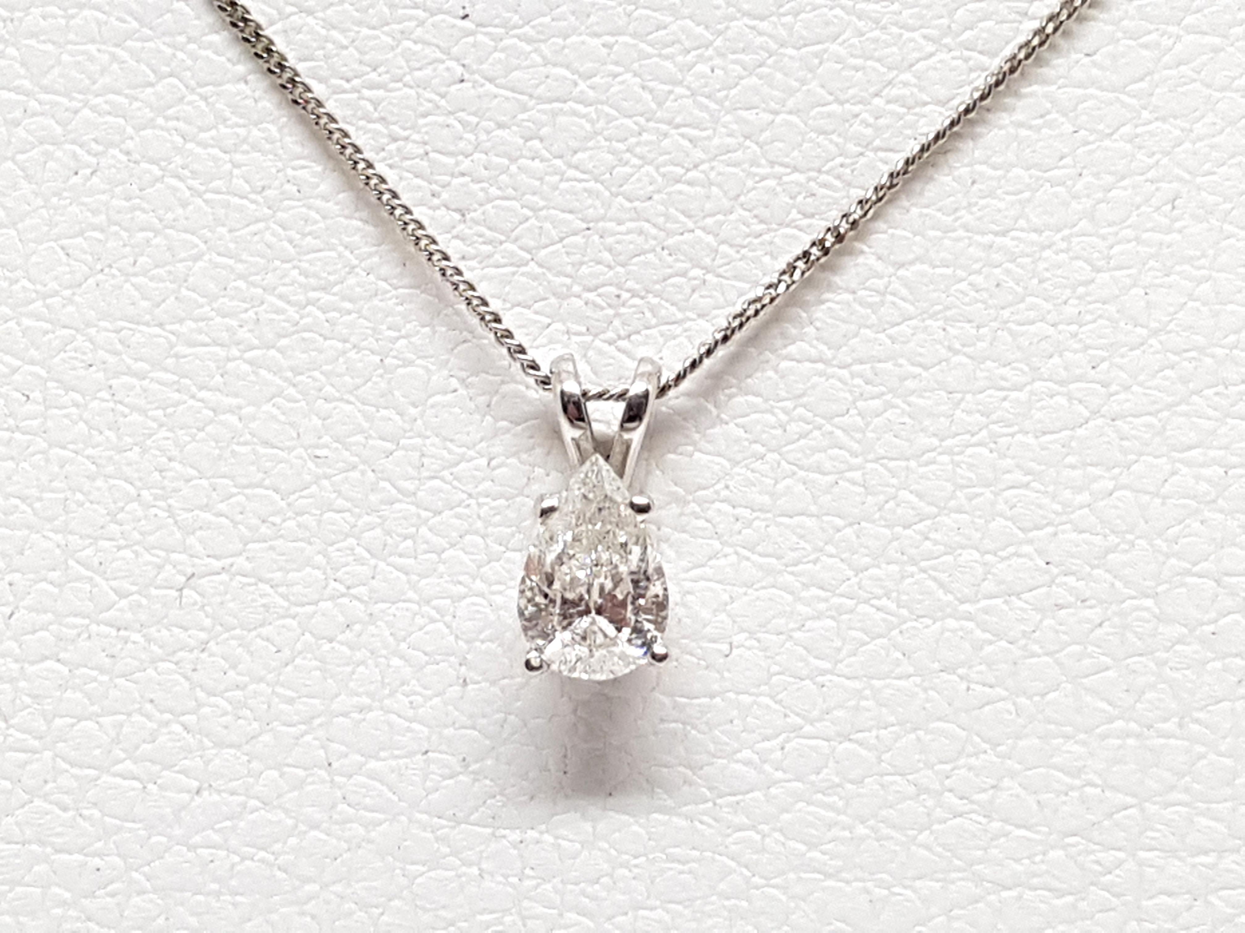 Gold: 18K White Gold. 
Weight: 2.16 gr. 
Diamond: 0.58ct. Colour: F Clarity: SI1 
Length Pendant: 1.00 cm. 
Width Pendant: 4.78 cm. 
Length chain: choose between 40, 42, 45 or 50cm. 
All our jewellery comes with a certificate and a 5 year guarantee
