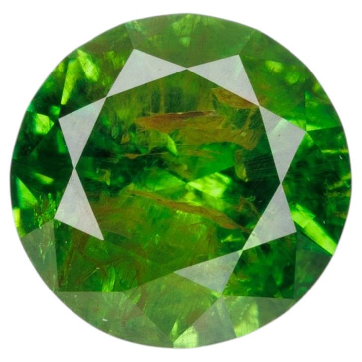 0.58 ct, Faceted Russian demantoid garnet