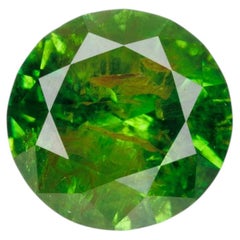 0.58 ct, Faceted Russian demantoid garnet