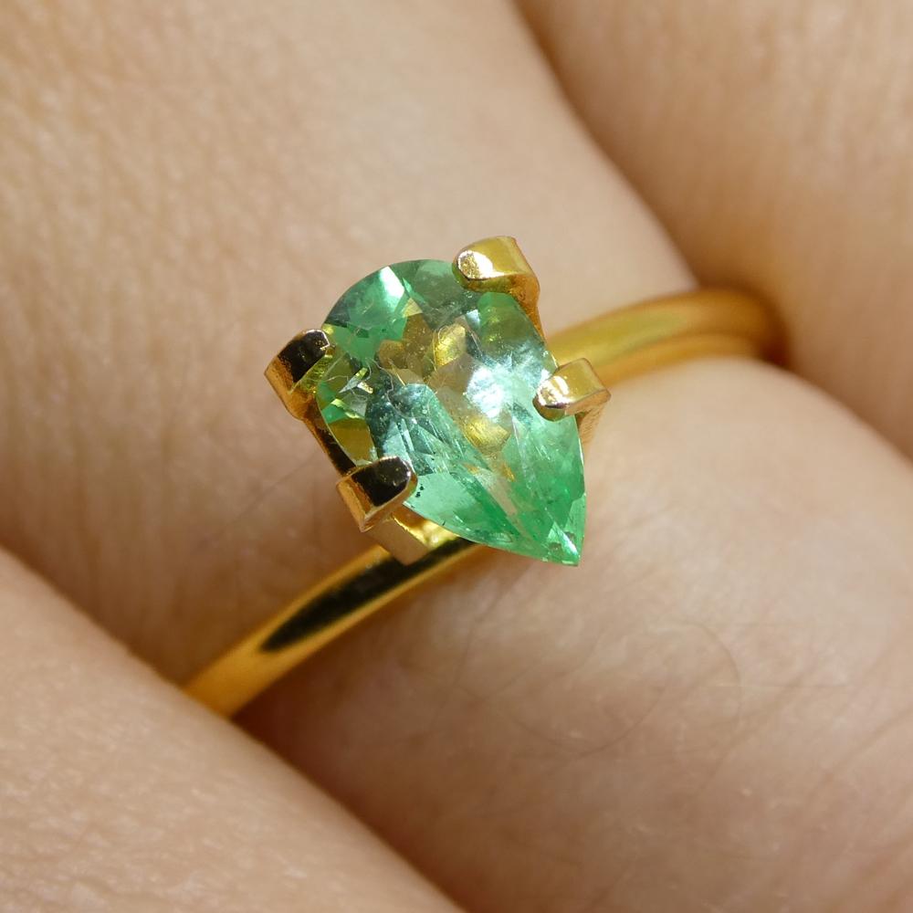 Description:

Gem Type: Emerald
Number of Stones: 1
Weight: 0.58 cts
Measurements: 7.61 x 4.80 x 3.27 mm
Shape: Pear
Cutting Style Crown: Brilliant Cut
Cutting Style Pavilion: Modified Brilliant Cut
Transparency: Transparent
Clarity: Very Slightly