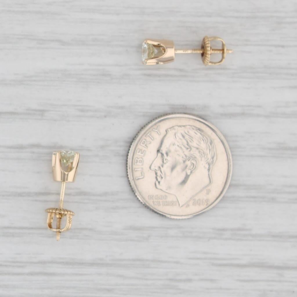 0.58ctw Diamond Stud Earrings 14k Yellow Gold Round Solitaire Screw Back Studs In Good Condition For Sale In McLeansville, NC