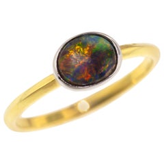 Anillo Paloma de Ópalo Negro de 0,59 ct en 18 quilates y platino de Joyería Cynthia Scott