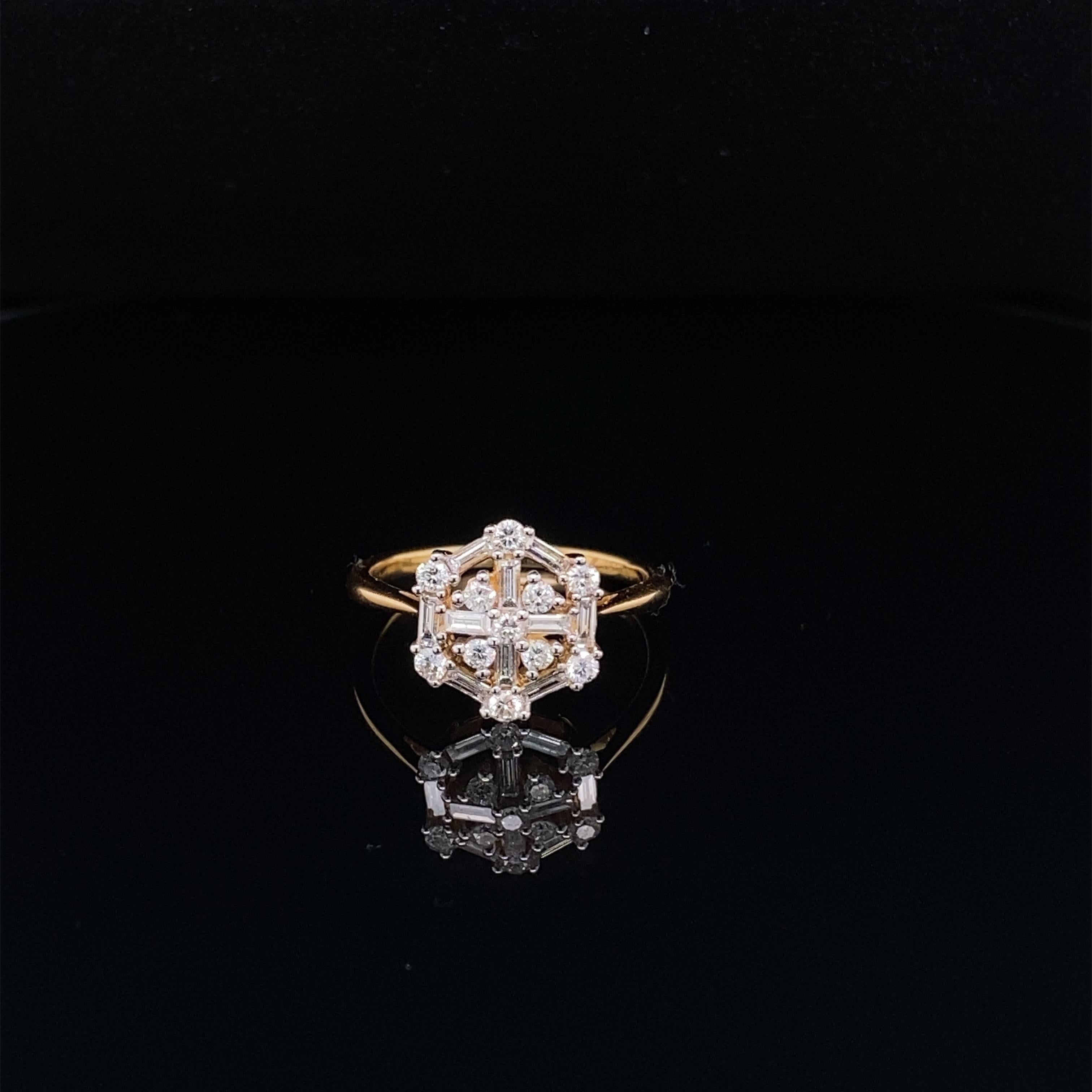 This stunning ring features a beautiful Snowflake Cluster of White Diamonds comprising of Baguette and Round Diamonds.
This ring is set in 18K Yellow Gold. 
Total Diamond Weight = 0.59 Carats. Ring Size is 6 1/2.