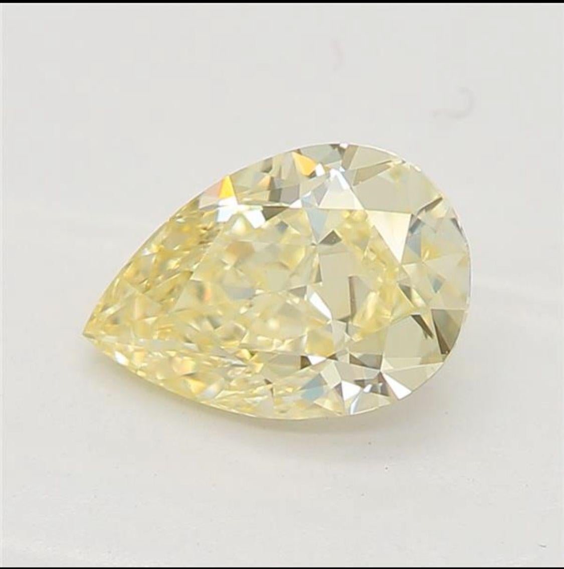 Women's or Men's 0.59 Carat Fancy Light Yellow Pear cut diamond VVS1 Clarity GIA Certified For Sale