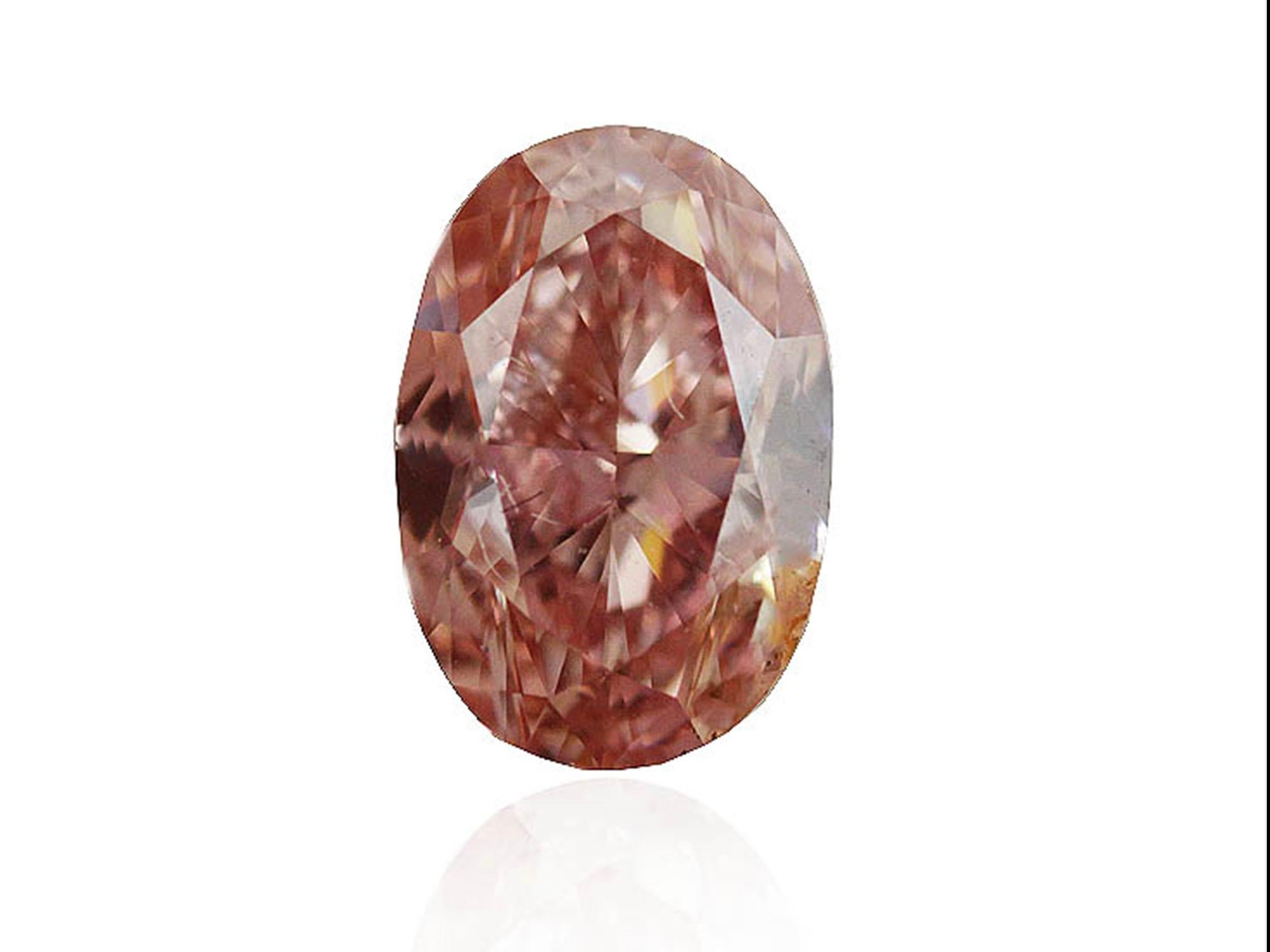 0.59 Carat Fancy Orangey Pink, Oval Cut Diamond, 18k Gold GIA Certified For Sale 2