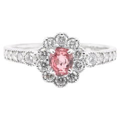 0.59 Carat, Natural Padparadscha Sapphire and Diamond Ring Set in Platinum