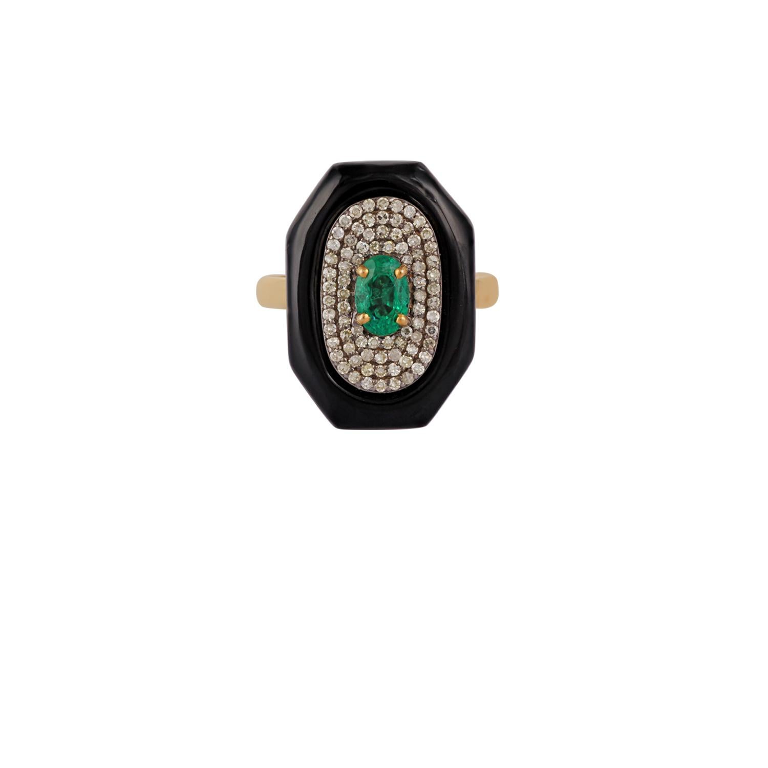 This is an elegant emerald, Black & diamond ring studded in 18k gold with 1 piece of Oval Cut  shaped Zambian emerald weight 0.59 carat which is surrounded Black onyx weight 5.97 carat & round shaped diamonds weight 0.35 carat, this entire ring