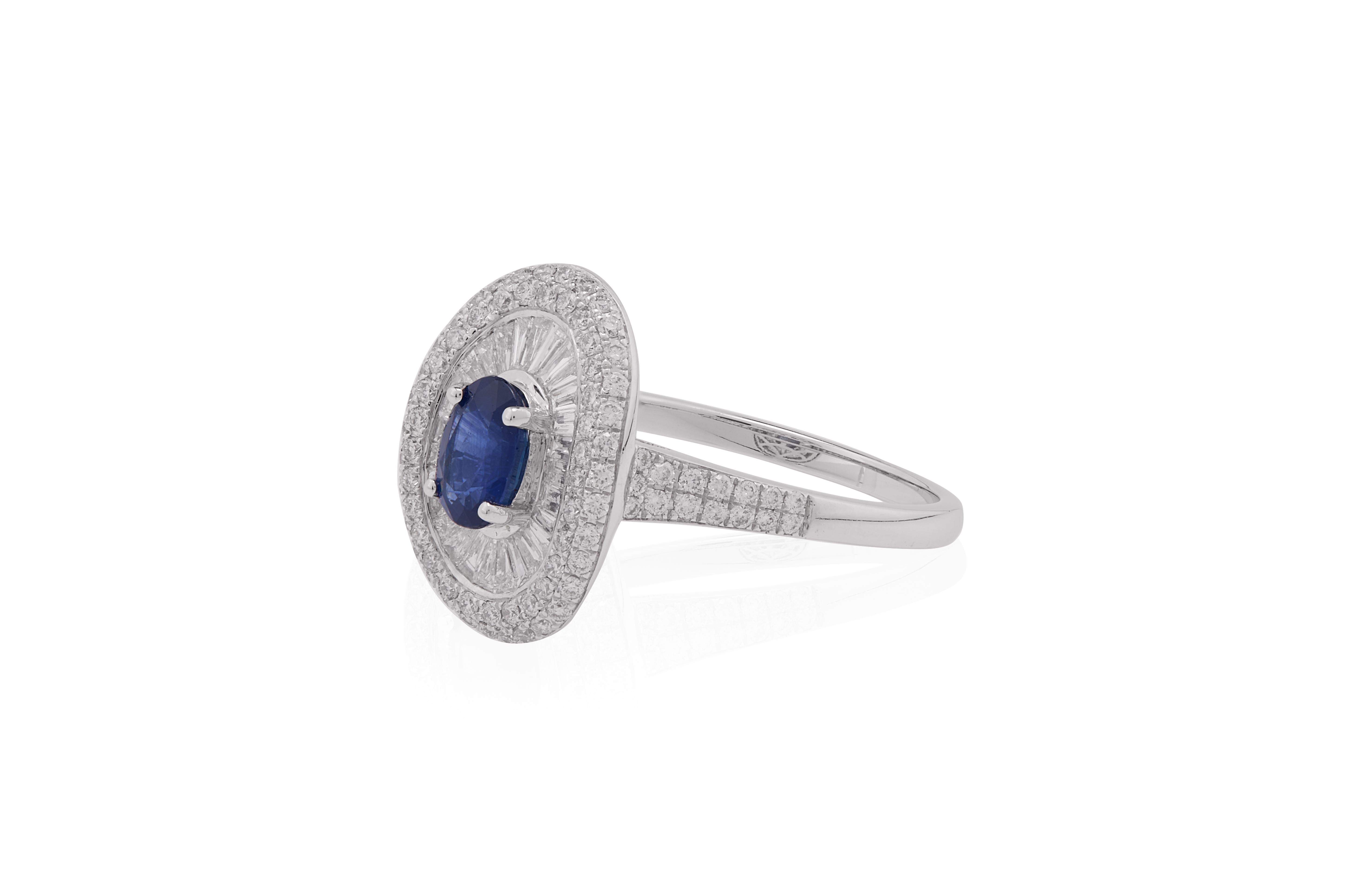 Oval Cut 0.590 Carat Blue Sapphire with Baguette and Diamond Ring in 18 Karat Gold For Sale