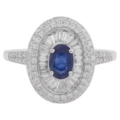 0.590 Carat Blue Sapphire with Baguette and Diamond Ring in 18 Karat Gold