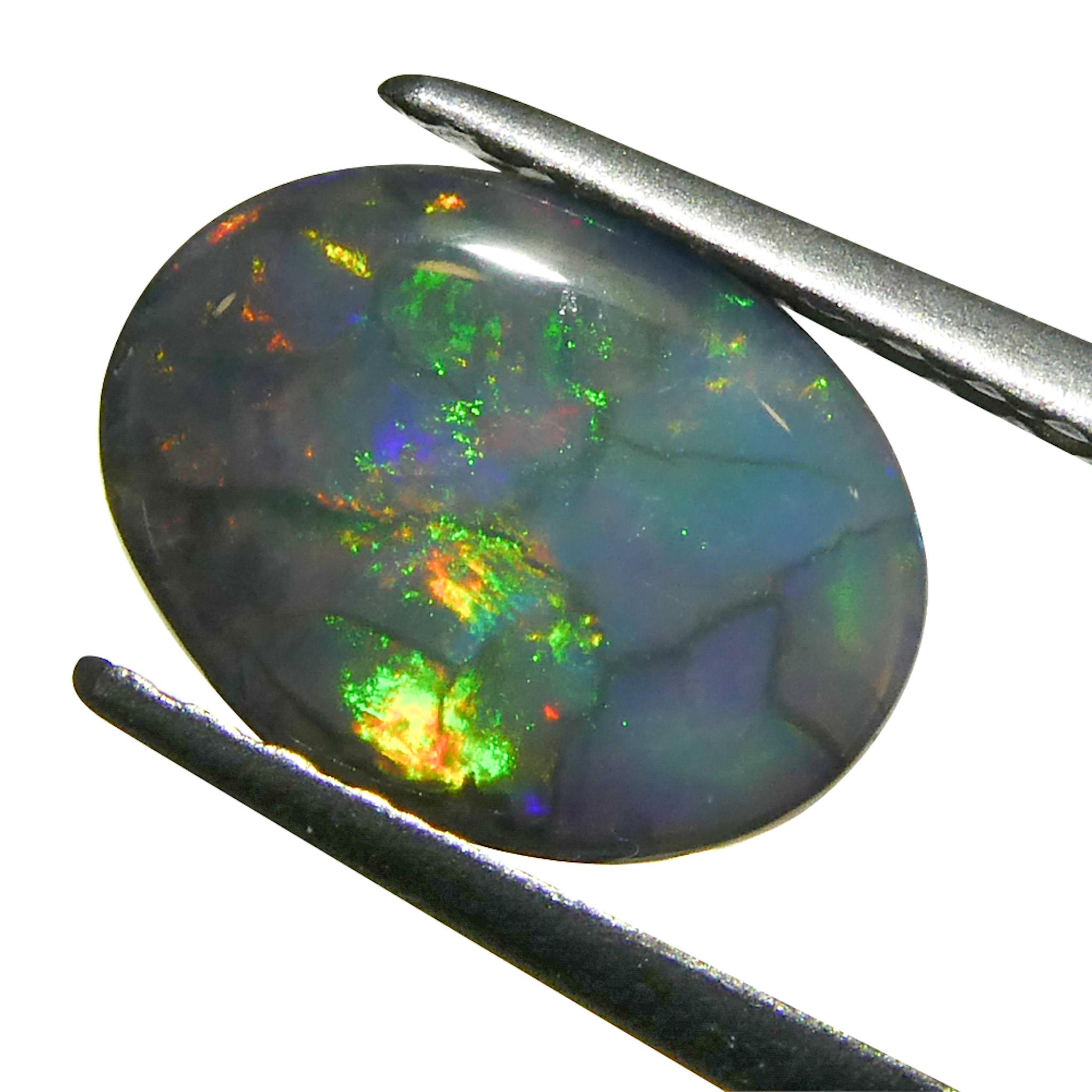 0.59ct Opale grigio ovale cabochon dall'Australia in vendita 6