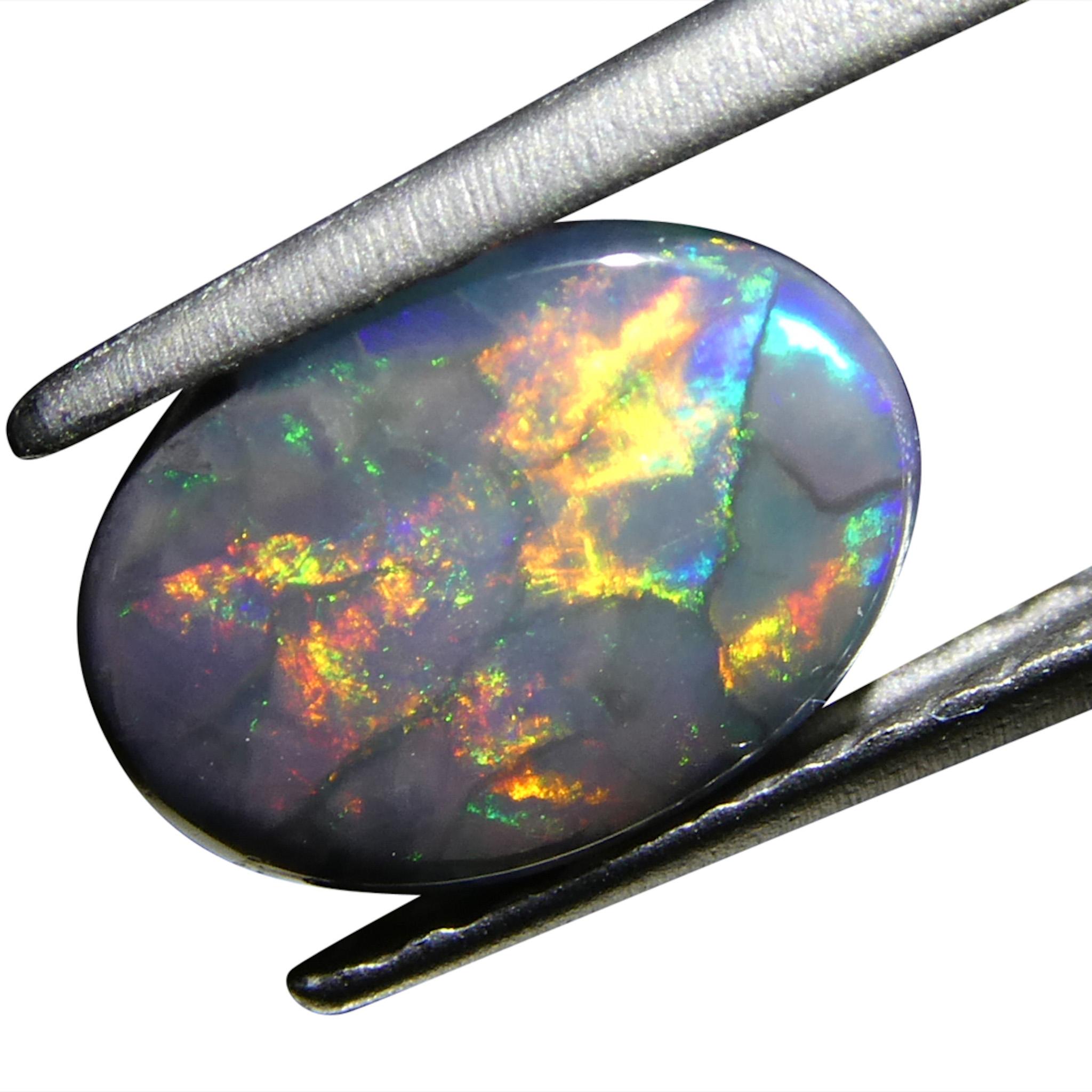 0.59ct Opale grigio ovale cabochon dall'Australia in vendita 8