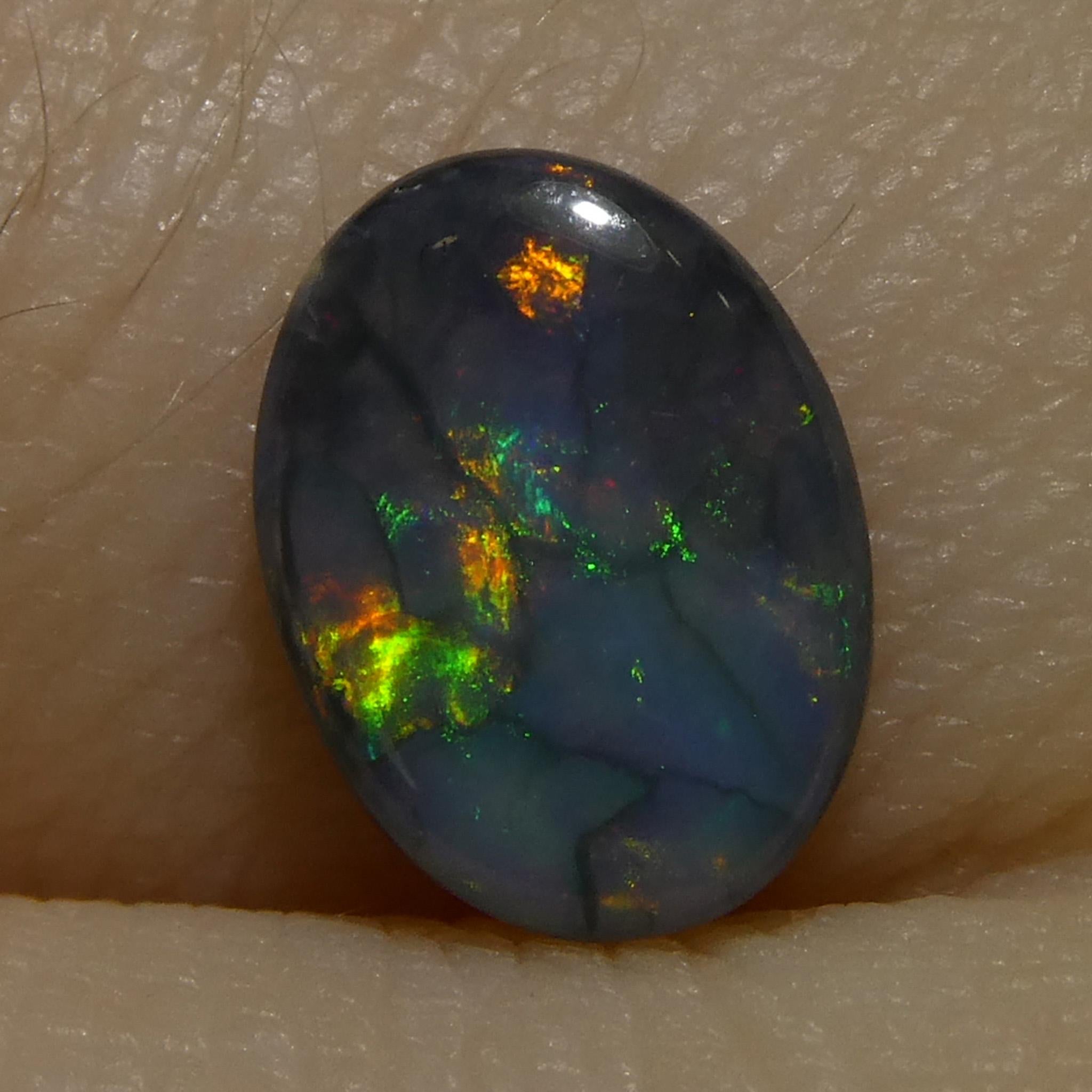 0.59ct Opale grigio ovale cabochon dall'Australia in vendita 1