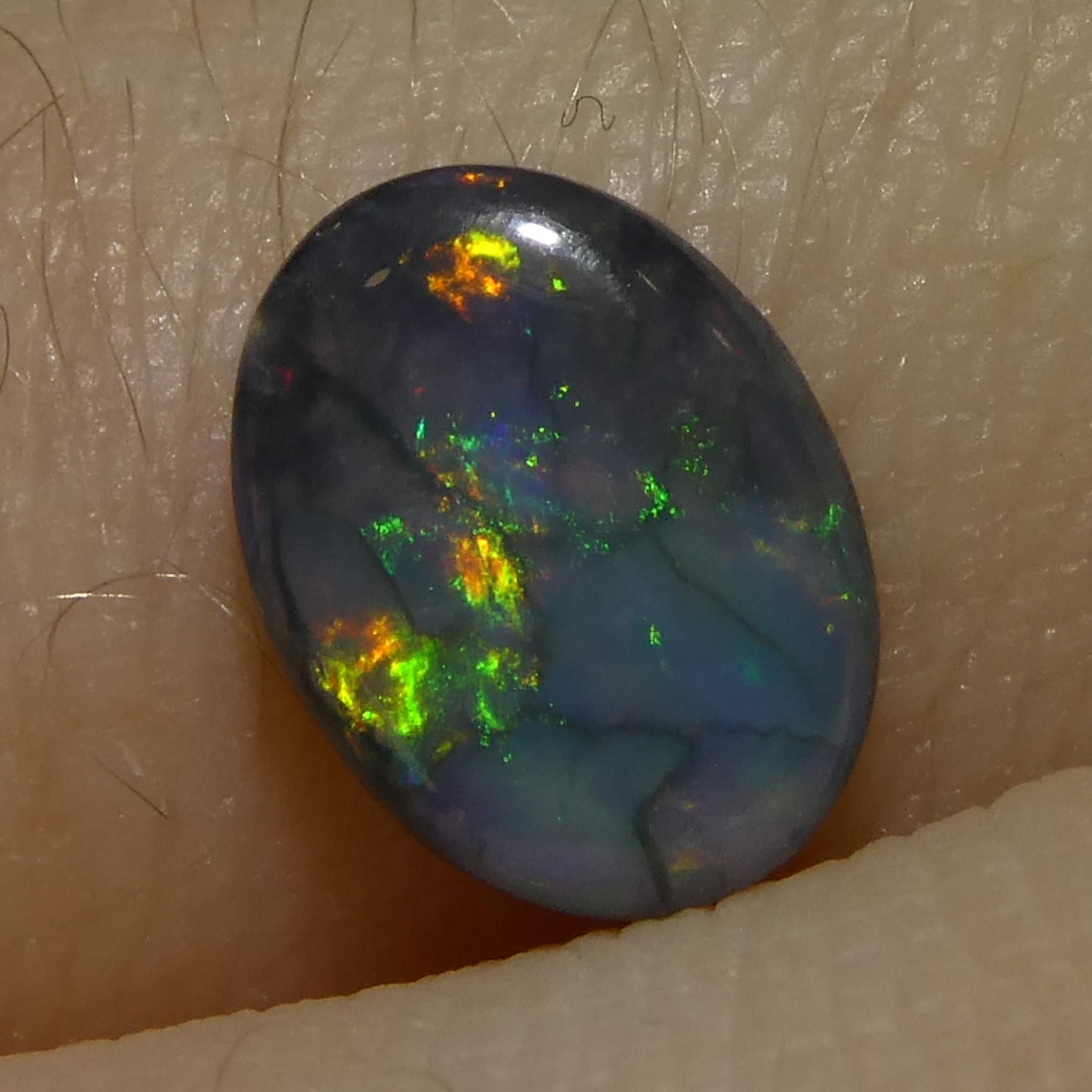 0.59ct Opale grigio ovale cabochon dall'Australia in vendita 2