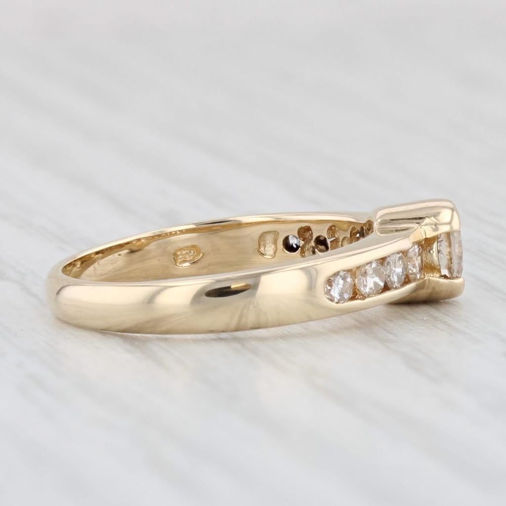 Gemstone Information:
- Natural Diamond -
Carats - 0.31ct 
Cut - Round Brilliant
Color - J - K
Clarity - SI2 

- Natural Diamonds -
Total Carats - 0.28ctw
Cut - Round Brilliant
Color - K - L
Clarity -  SI1 - I2

Metal: 14k Yellow Gold
Weight: 3.3