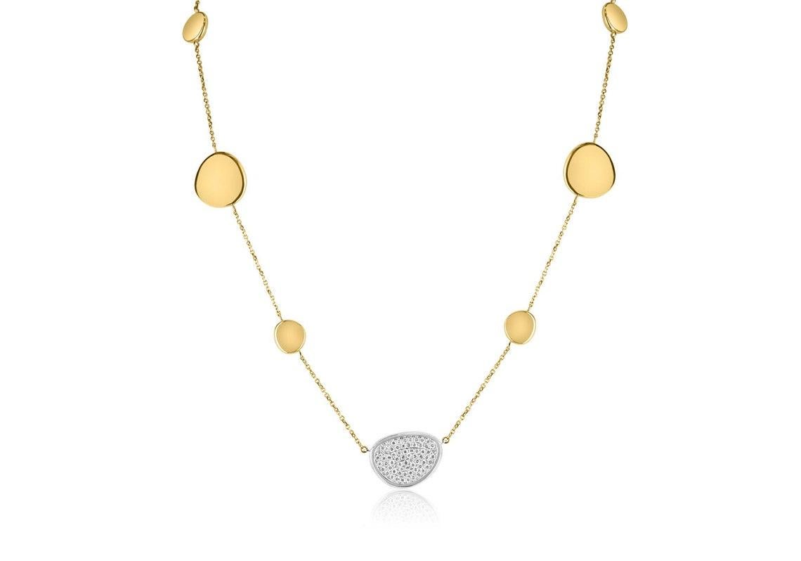 Erhöhen Sie Ihren Stil mit unserer Halskette aus zweifarbigem Gold mit Diamantbesatz, die eine wahre Verkörperung künstlerischer Eleganz darstellt. Dieses exquisite Stück zeichnet sich durch ein einzigartiges Design mit acht unregelmäßig geformten