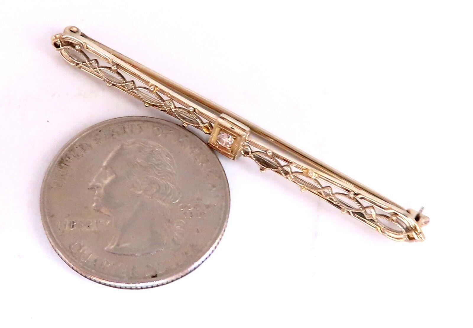 Vintage Gold Brooch Pin

.05ct natural round diamonds

H-color Vs-2 Clarity

2.25 inch long 

Handmade 

14kt Gold

2.7 Grams.