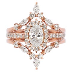 Verlobungsring mit 0.5 Karat ovalem Diamant-Halo und zwei verschachtelten Bändern –  „Nia“ und „Iceland“