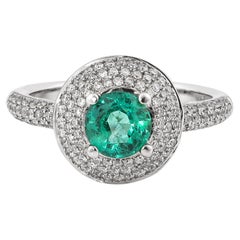 0.6 Carat Emerald and White Diamond Ring in 14 Karat White Gold