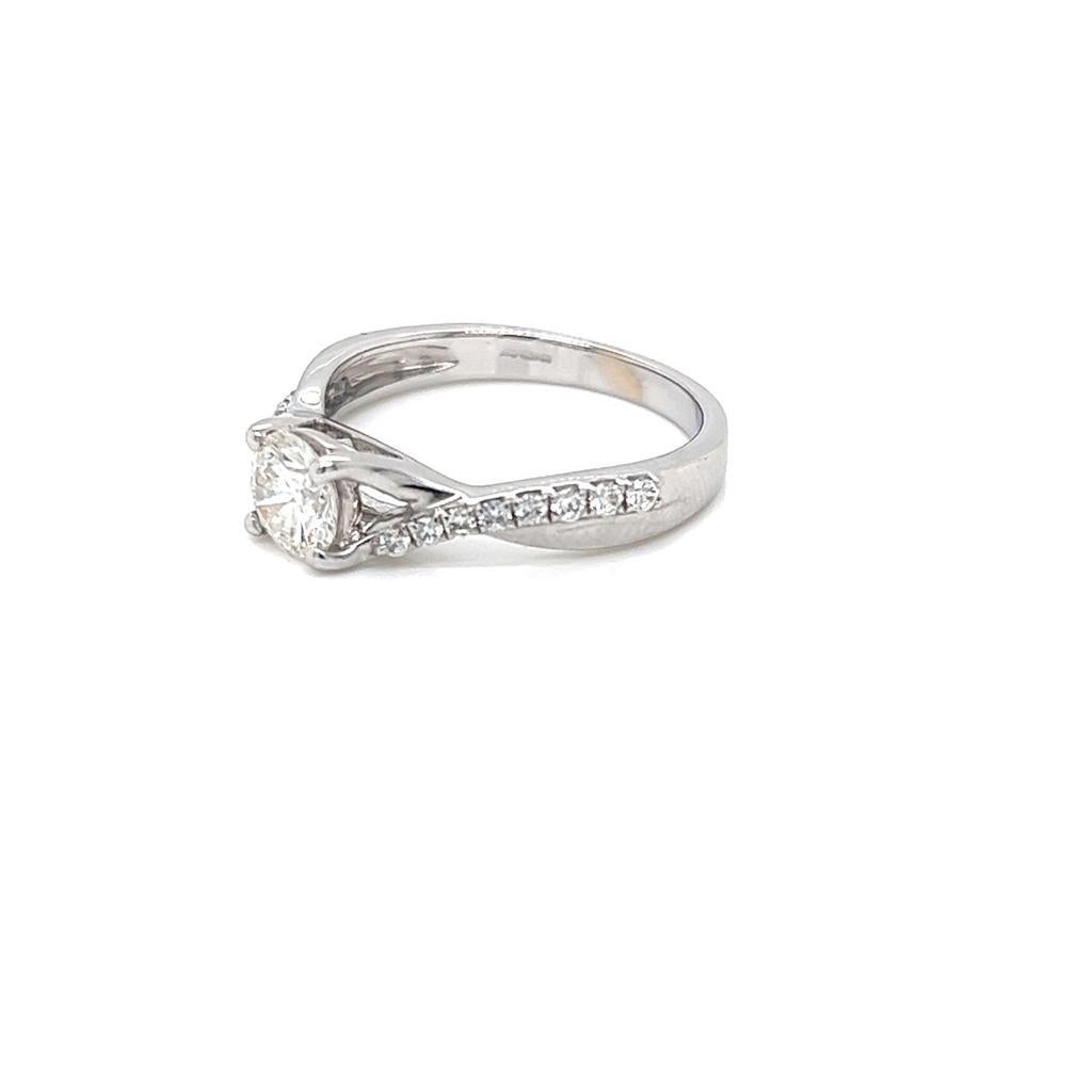 Contemporary 0.6 Carat Round Brilliant Diamond Ring in 18 Karat White Gold For Sale