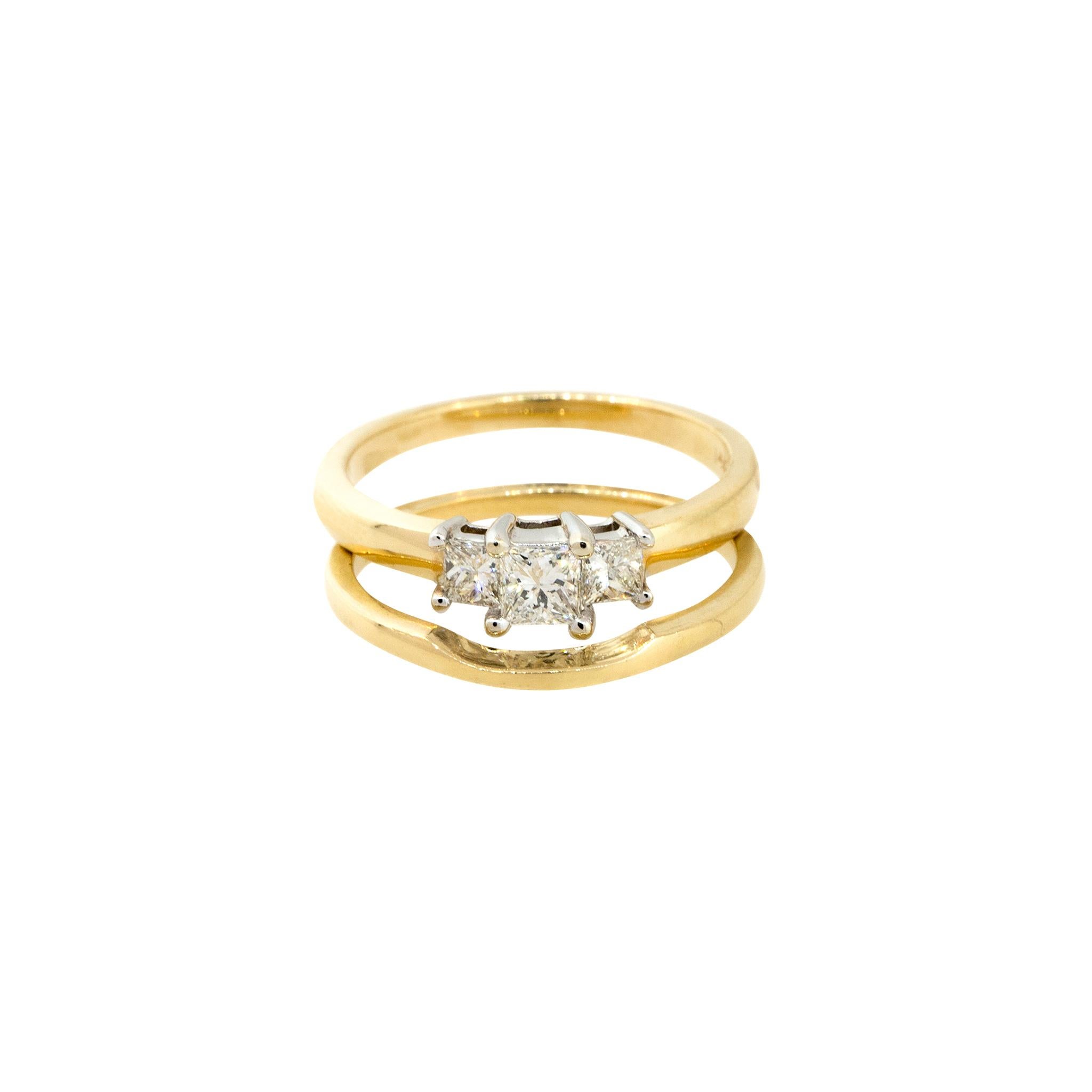 gold band with 3 diamonds
