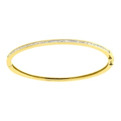 Bracelet jonc en or jaune 14 carats avec diamants baguettes de 0,60 carat
