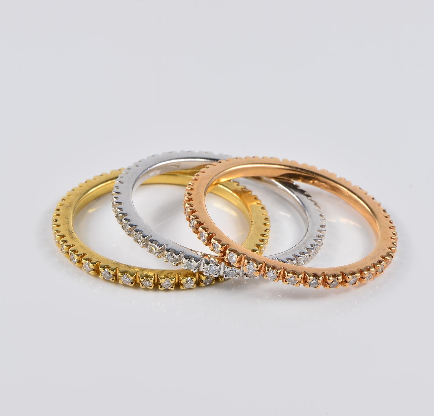 Distinctive trio of eternity rings
crafted of solid 18 KT gold marked
Appealing three colours of gold: white , yellow and rose gold
To stand all together, single or mixed with others
Set throughout with 96 Diamonds for .60 Ct of Brilliant cut