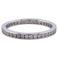 Anello a eternità completa con diamanti incastonati a canale da 0,60 carati, misura L 1/2