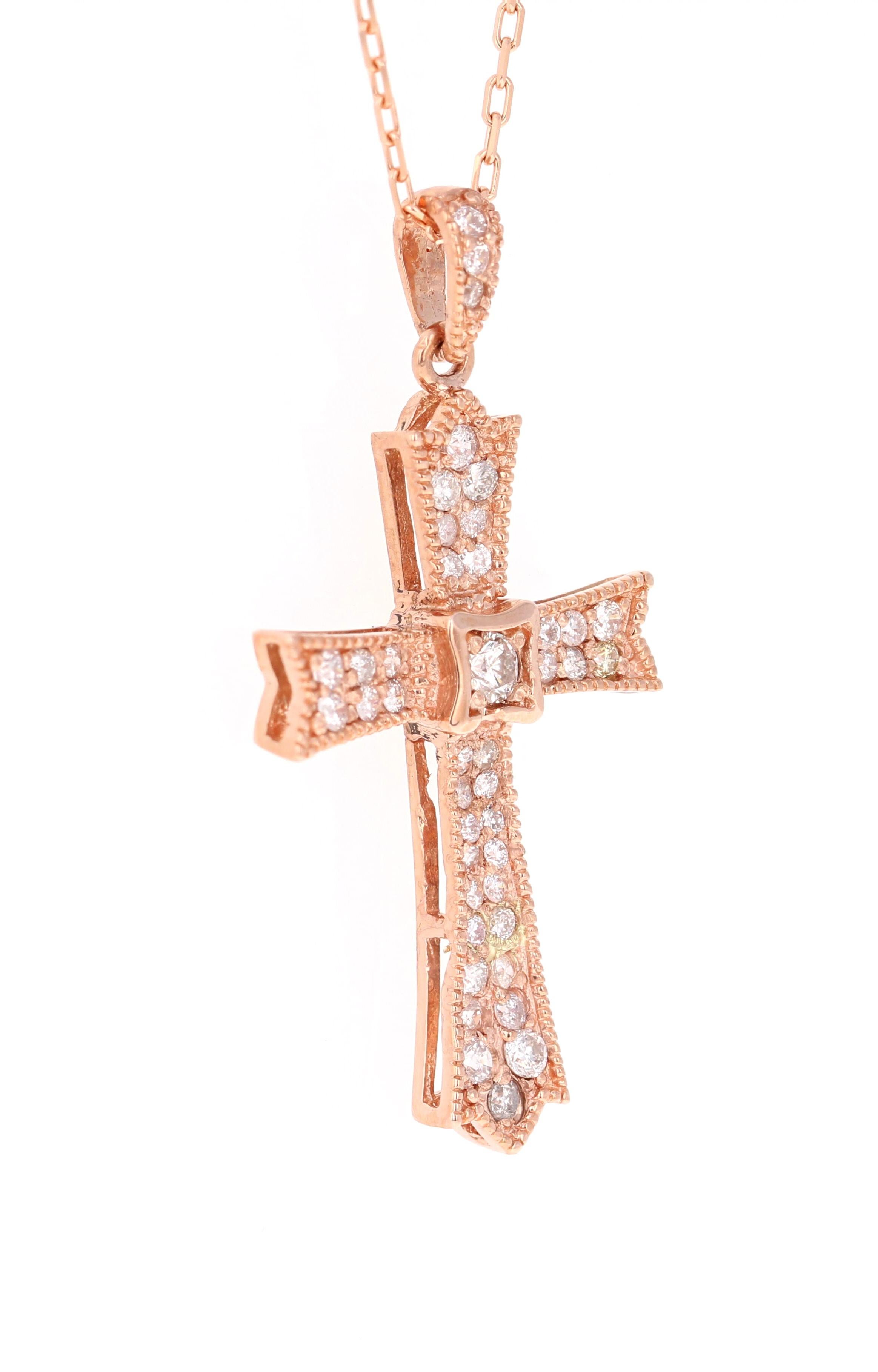 
This pendant has 42 Round Cut Diamonds that weigh 0.60 Carats. The clarity is SI and color is F. 

Made in 14K Rose Gold weighing approximately 5.1 grams.  

The chain is 8.5 inches in length and with the pendant it is 10 inches long.
